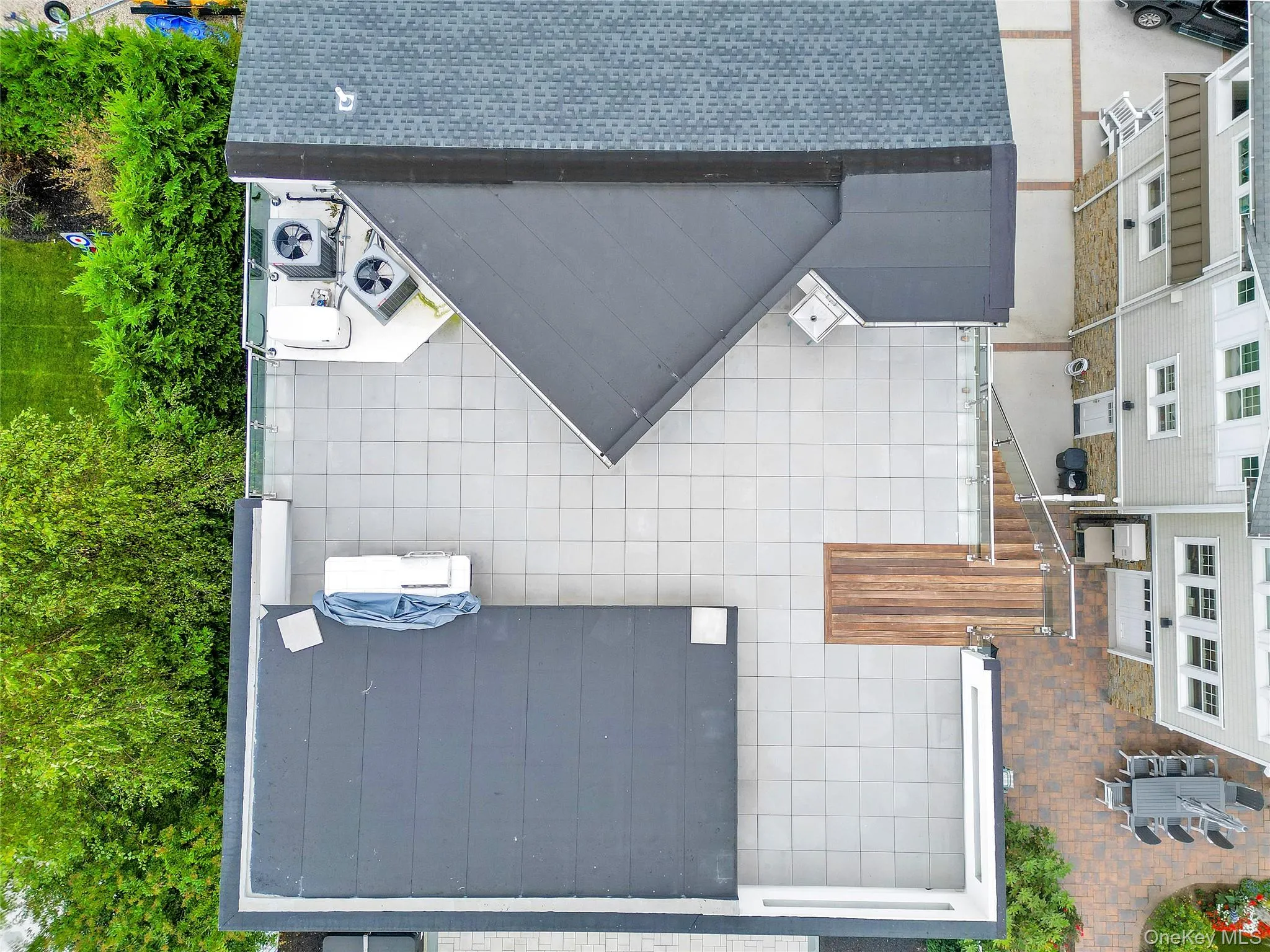 Heated Roof Deck with Barbeque Setup with Fantastic Views. Heated Roof Deck with Barbeque Setup with Fantastic Views.