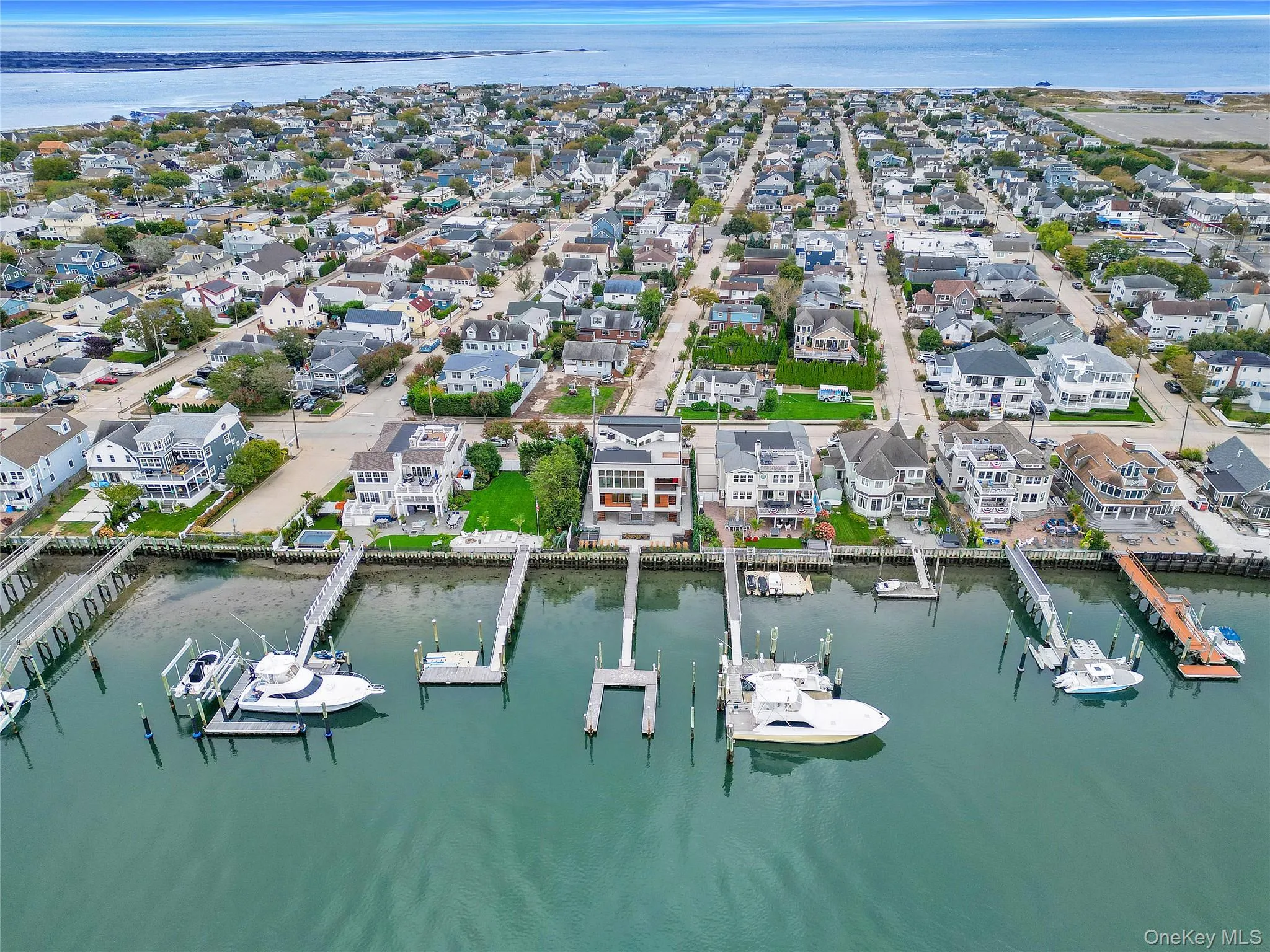 Aerial view of property's location featuring Reynolds Channel and nearby suburban area Aerial view of property's location featuring Reynolds Channel and nearby suburban area