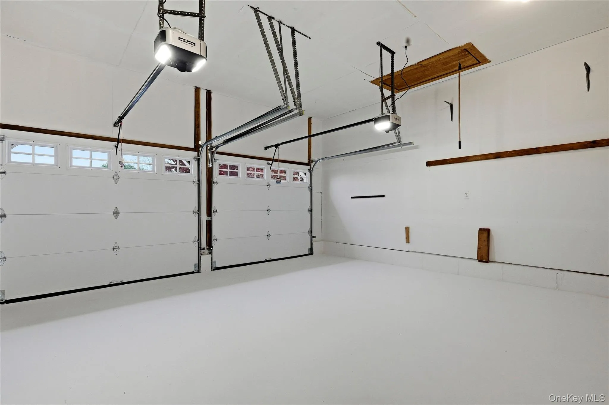 Garage with a garage door opener Garage with a garage door opener
