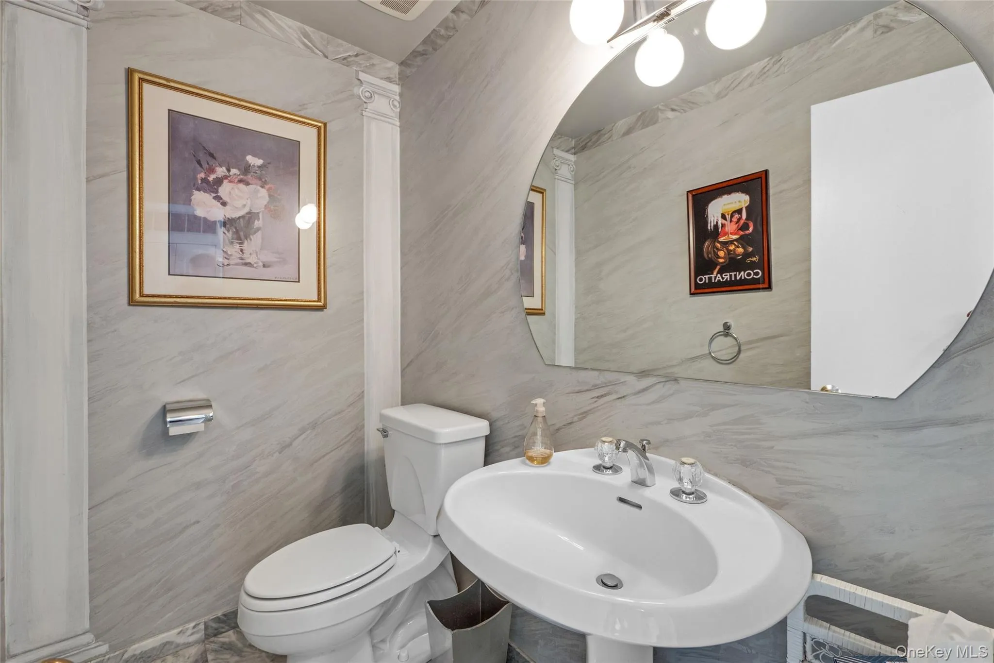 Half bath with a sink and toilet Half bath with a sink and toilet