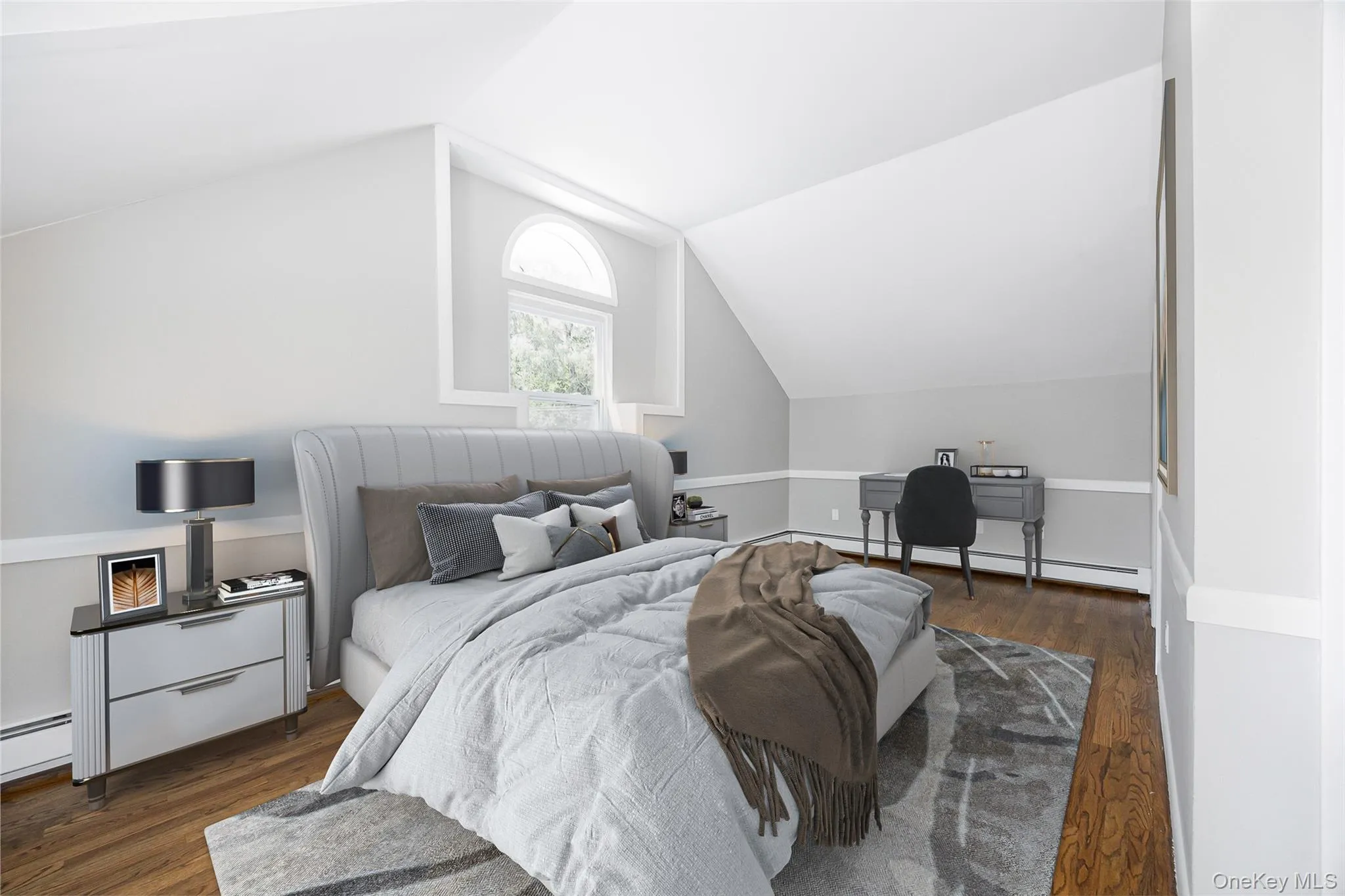 Bedroom featuring dark wood-style floors, vaulted ceiling, a desk, and a baseboard radiator Bedroom featuring dark wood-style floors, vaulted ceiling, a desk, and a baseboard radiator