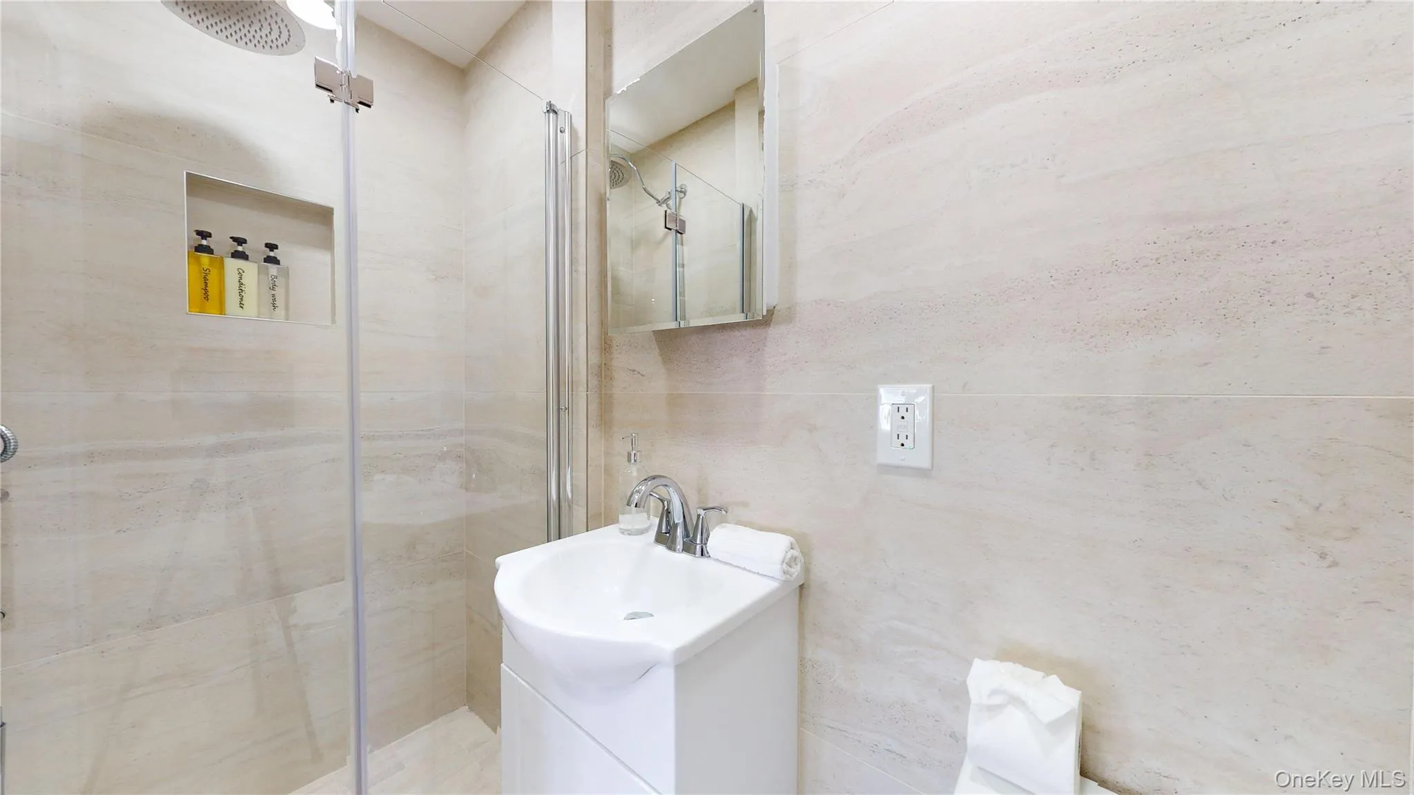 Full bathroom featuring vanity and a shower stall Full bathroom featuring vanity and a shower stall
