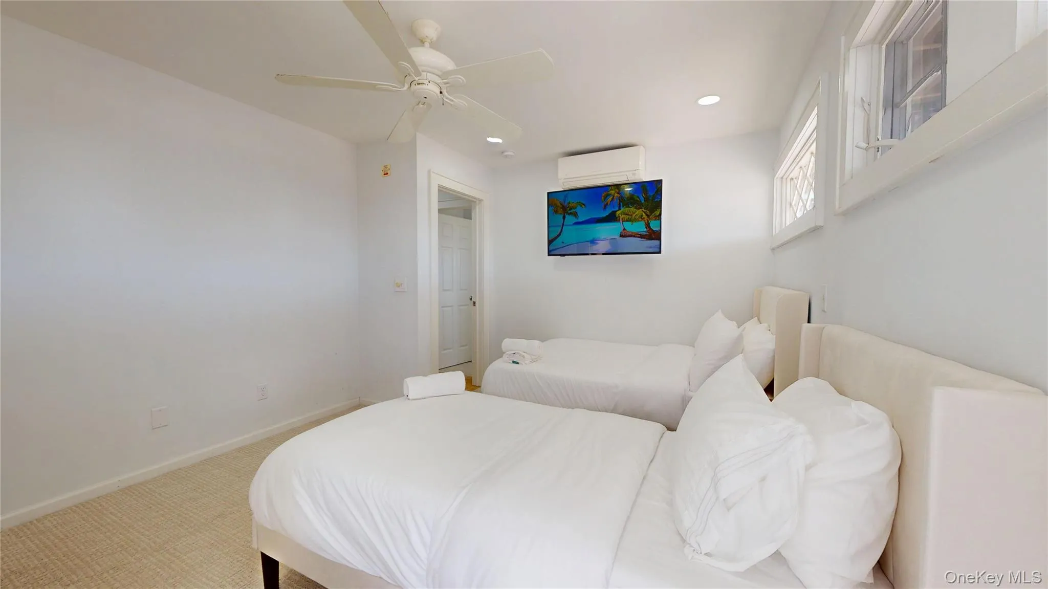 Bedroom with recessed lighting, carpet floors, and a ceiling fan Bedroom with recessed lighting, carpet floors, and a ceiling fan