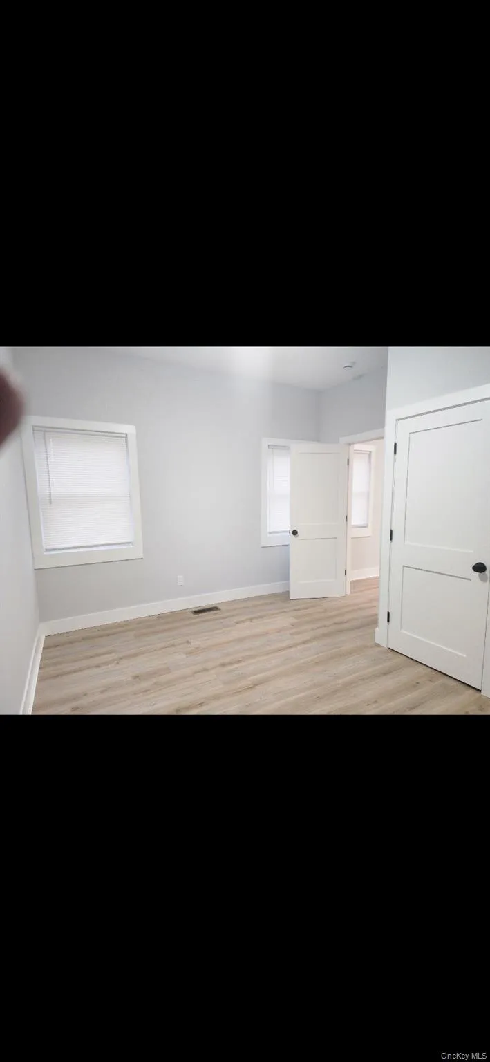 baseboards and light wood finished floors baseboards and light wood finished floors