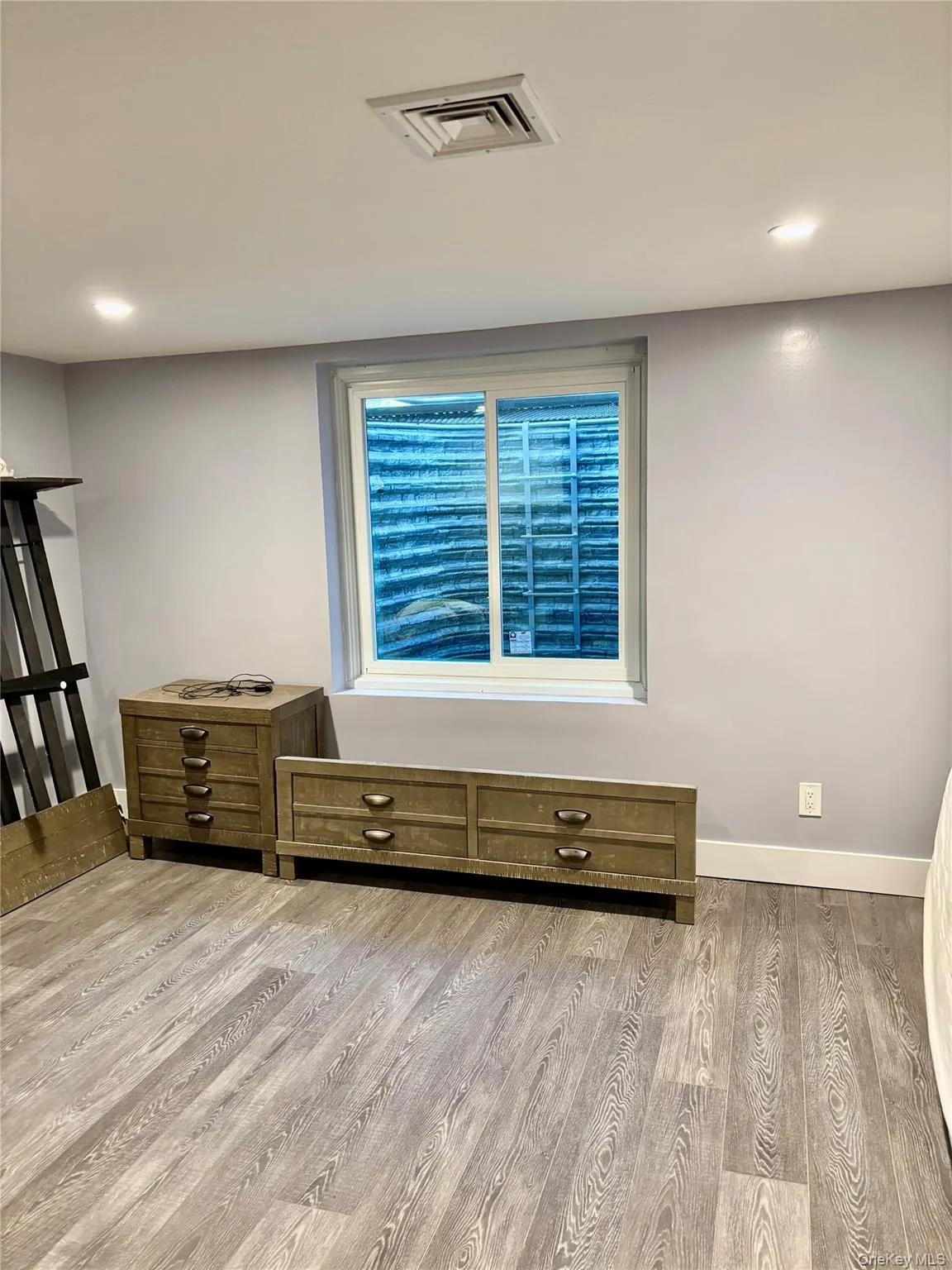 Bonus Lower Level Bedoom - Detailed view of wood finished floors and recessed lighting Bonus Lower Level Bedoom - Detailed view of wood finished floors and recessed lighting