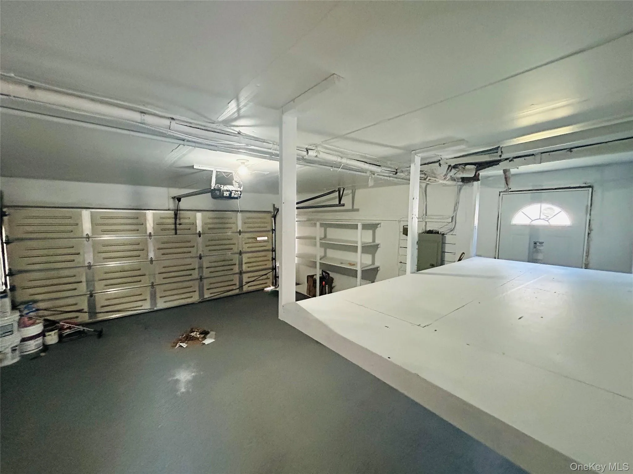 View of two car garage, large storage View of two car garage, large storage