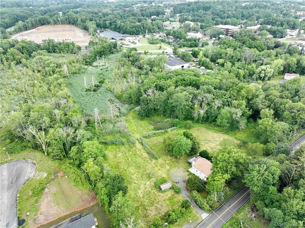 View of property location featuring a forest View of property location featuring a forest