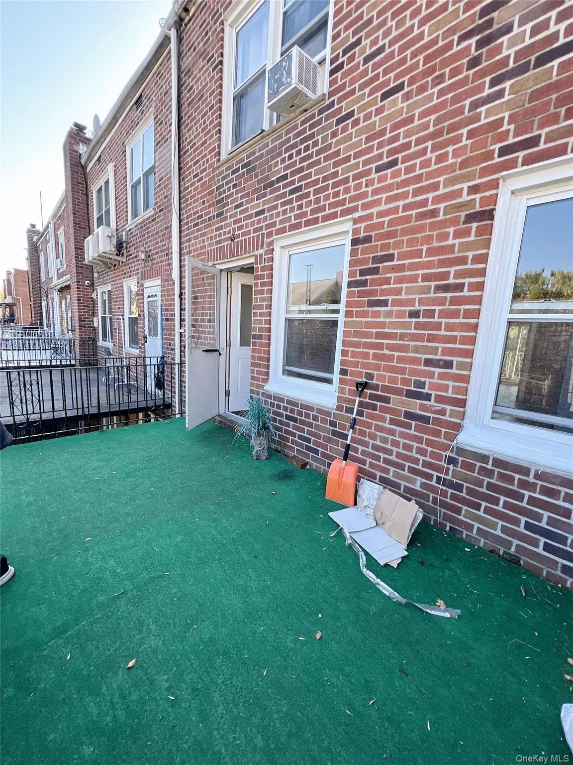 Property entrance with brick siding and a residential view Property entrance with brick siding and a residential view