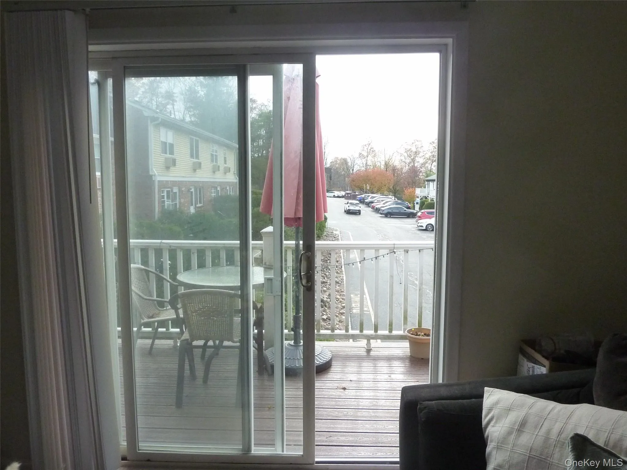 Doorway to outside featuring wood finished floors Doorway to outside featuring wood finished floors