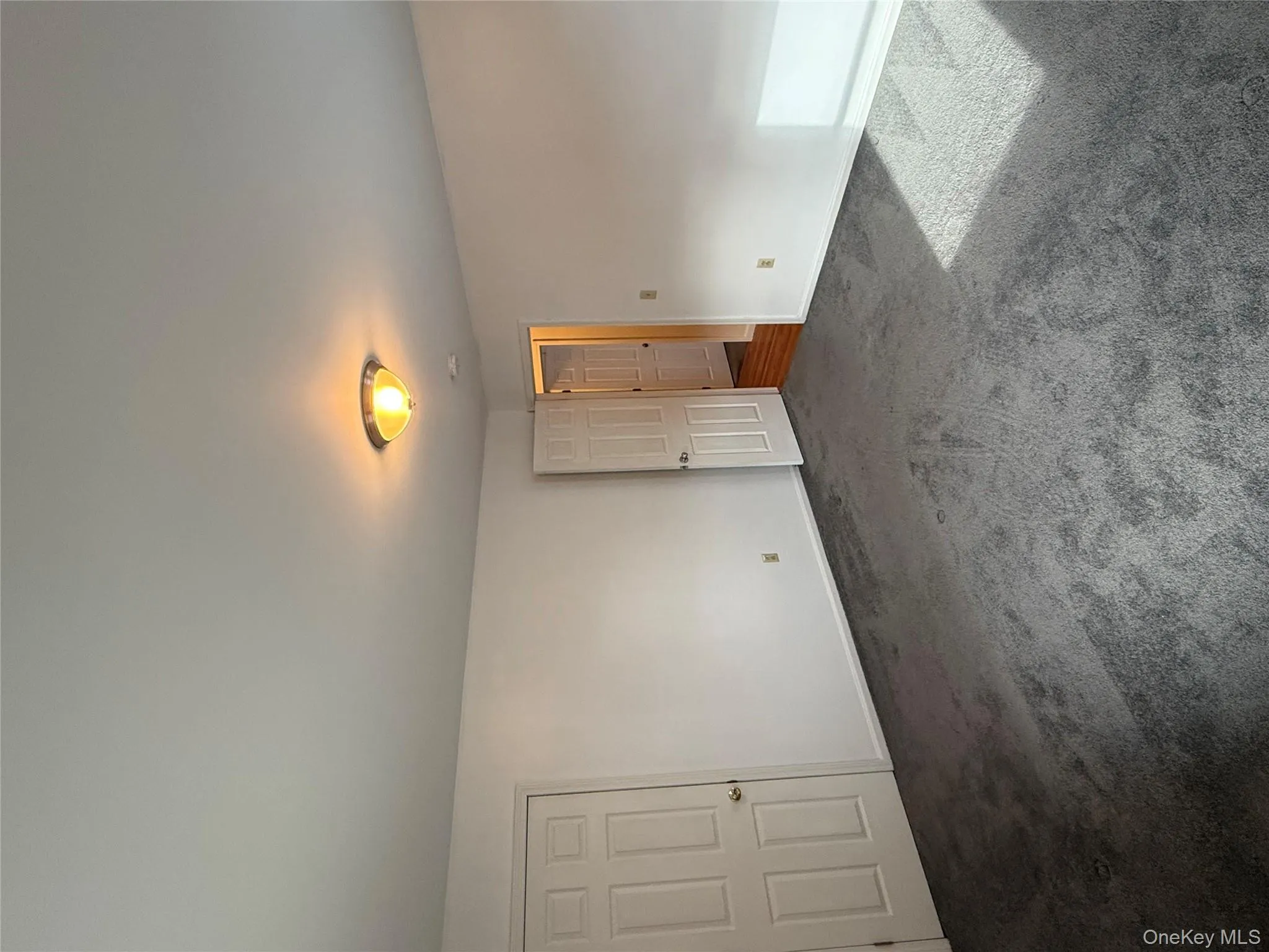 Unfurnished bedroom with carpet and baseboards Unfurnished bedroom with carpet and baseboards