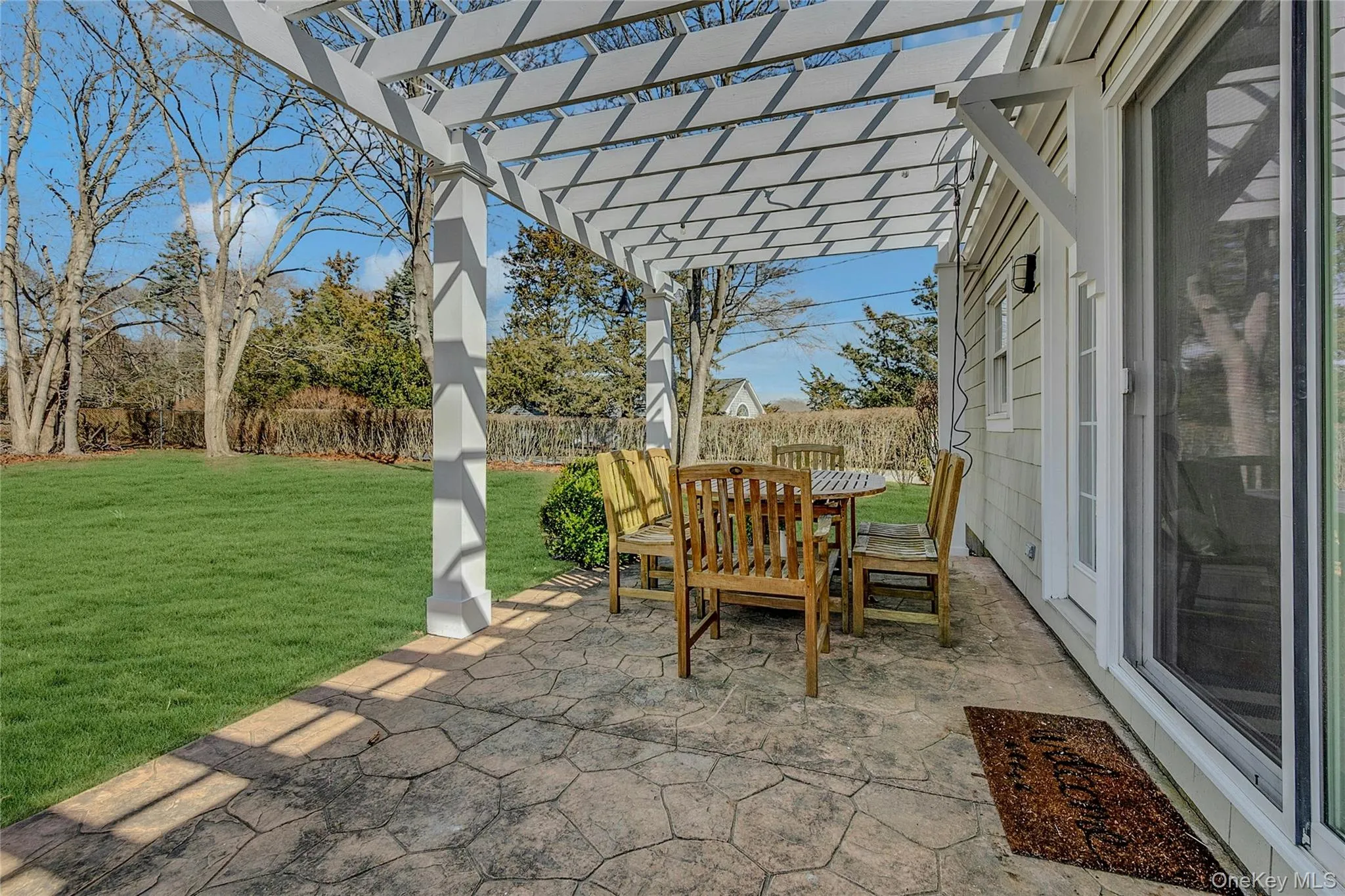 View of patio featuring a pergola and outdoor dining View of patio featuring a pergola and outdoor dining