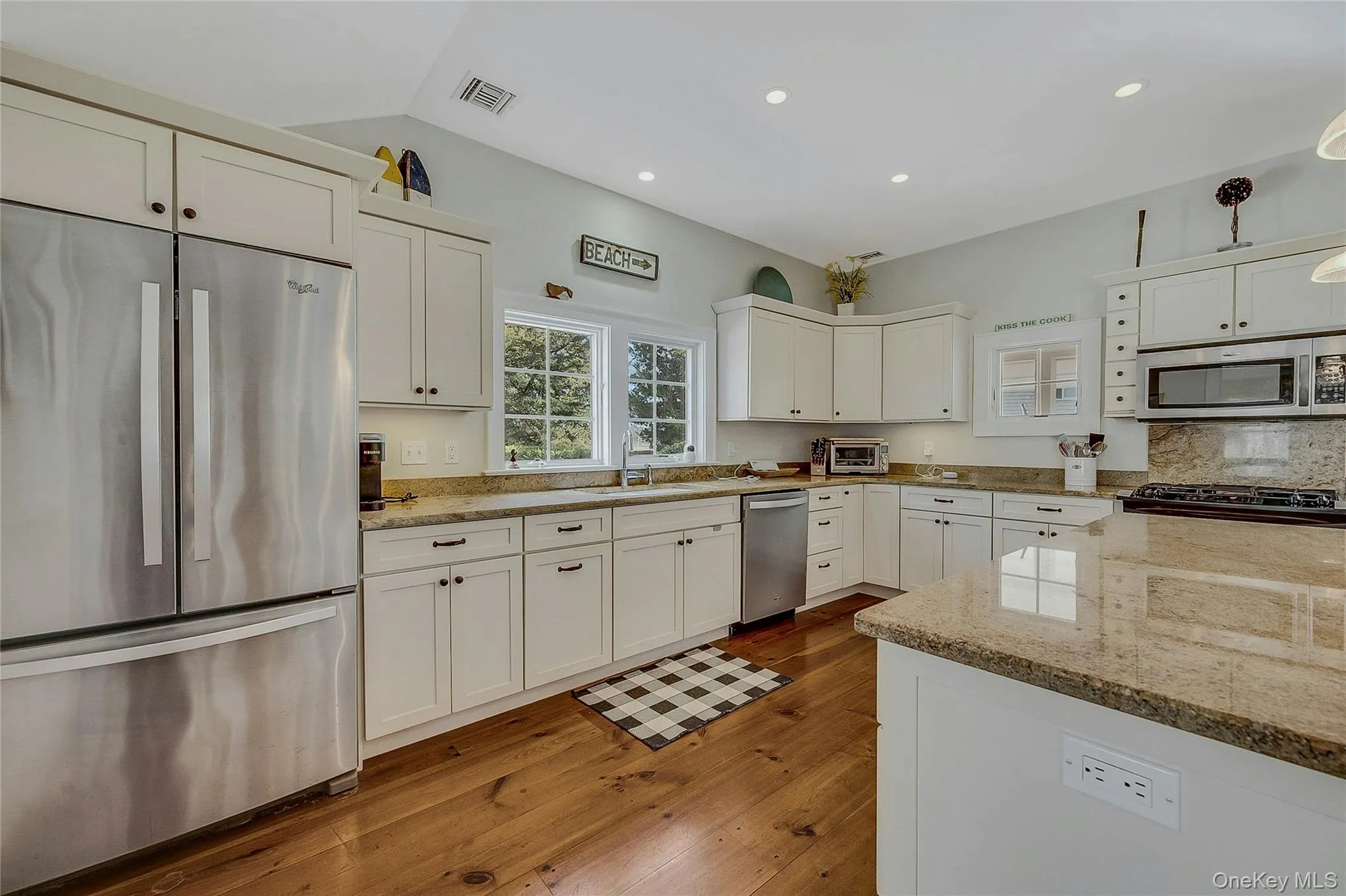 Kitchen featuring lots of cabinetry, granite countertops, stainless steel appliances Kitchen featuring lots of cabinetry, granite countertops, stainless steel appliances
