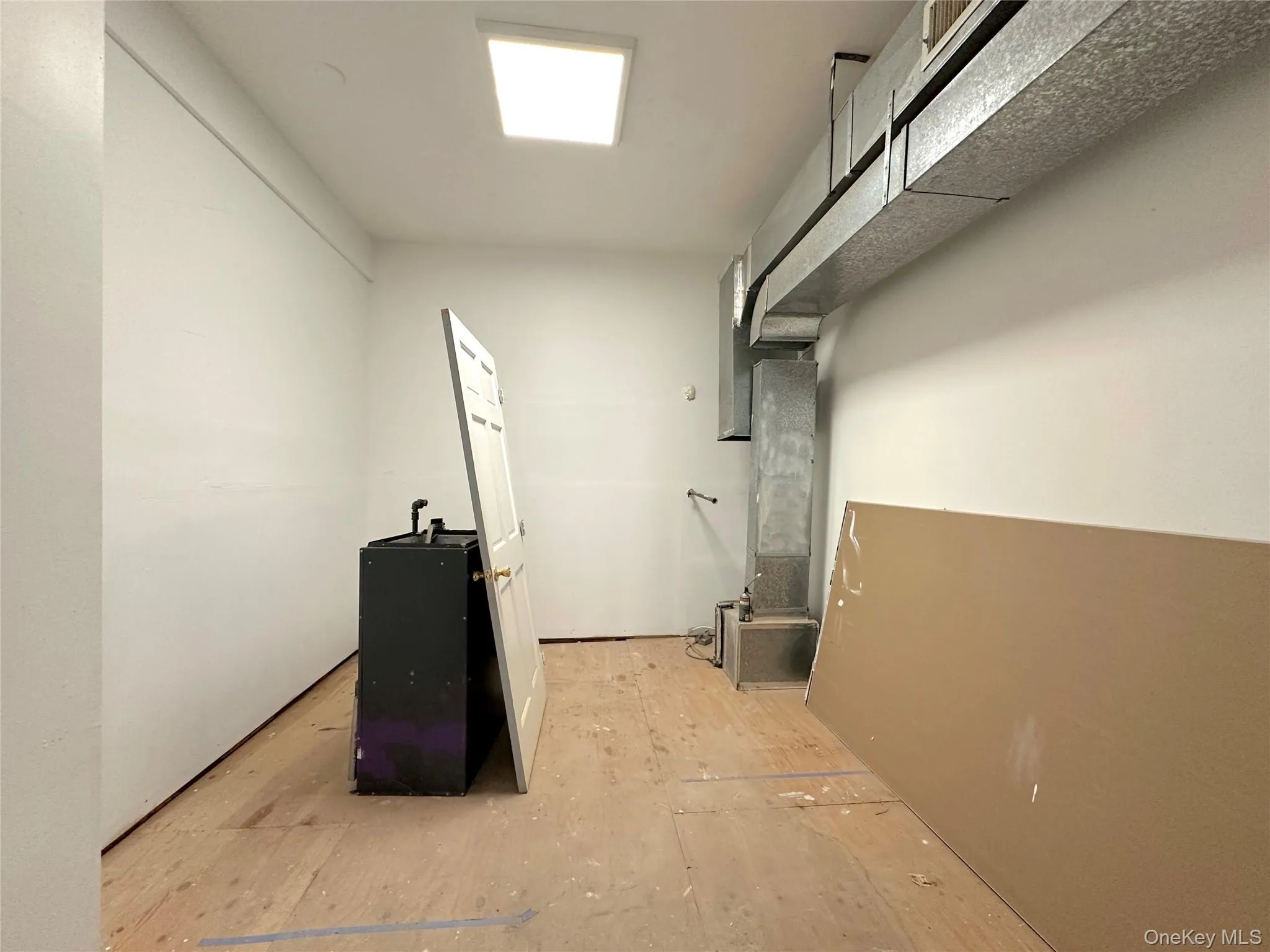 Basement with heating unit Basement with heating unit