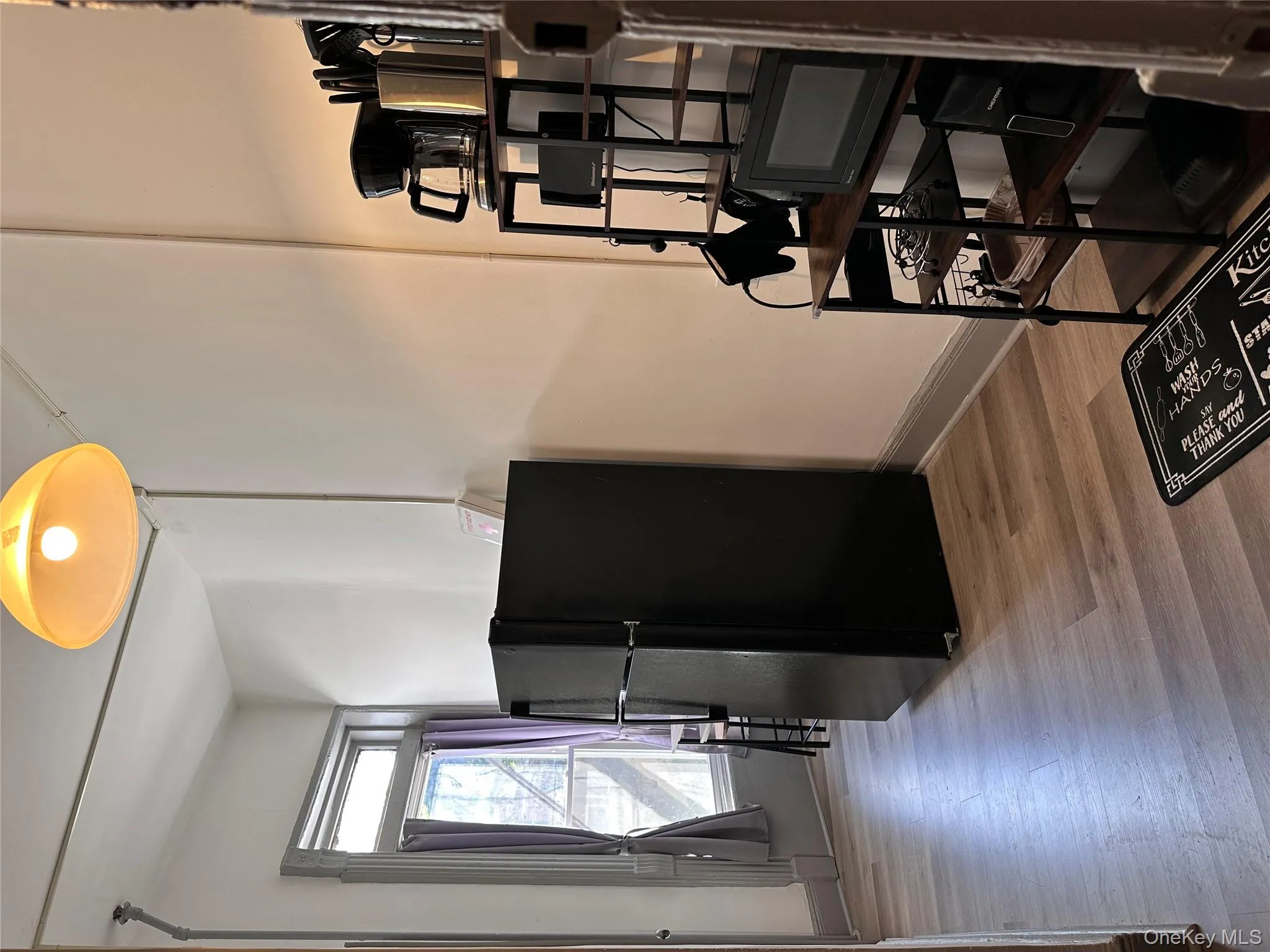 Dining room featuring light wood-type flooring and baseboards Dining room featuring light wood-type flooring and baseboards