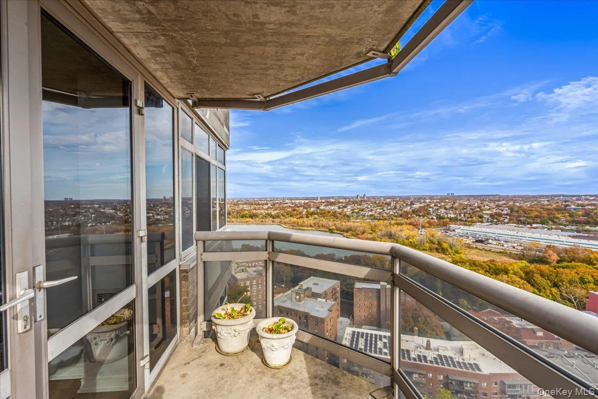 Living Room Balcony featuring a lake view Living Room Balcony featuring a lake view