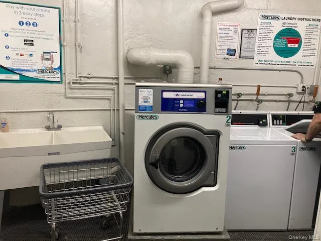 Shared laundry featuring independent washer and dryer Shared laundry featuring independent washer and dryer