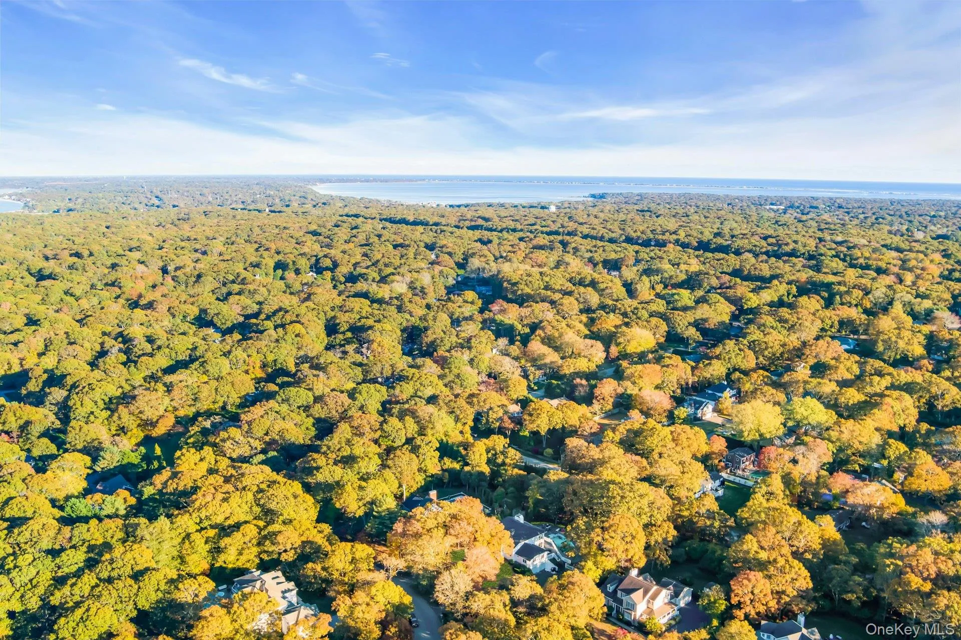 Aerial overview of property's location featuring a large body of water Aerial overview of property's location featuring a large body of water