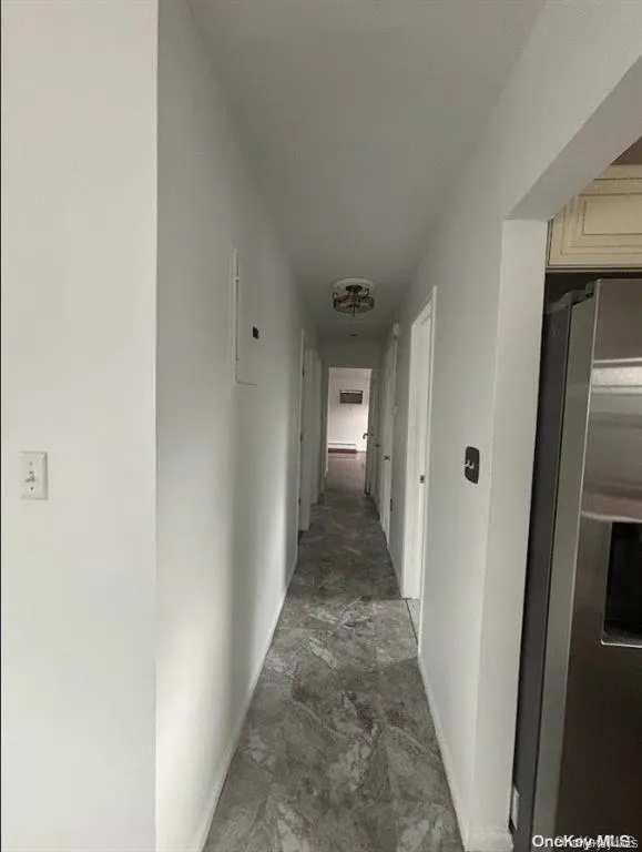 Hallway with baseboards Hallway with baseboards