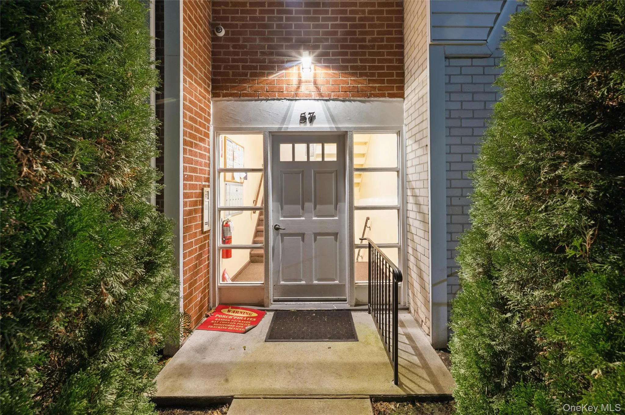 Doorway to property with brick siding Doorway to property with brick siding