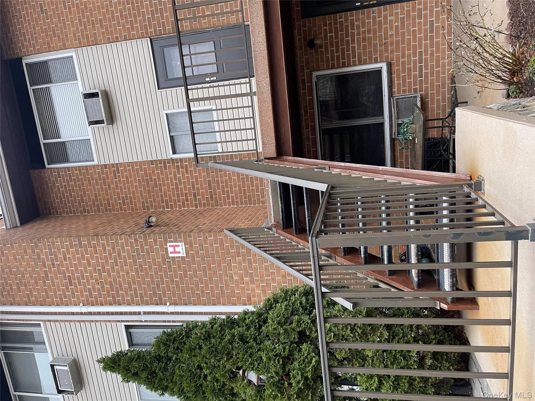 View of exterior entry featuring brick siding View of exterior entry featuring brick siding
