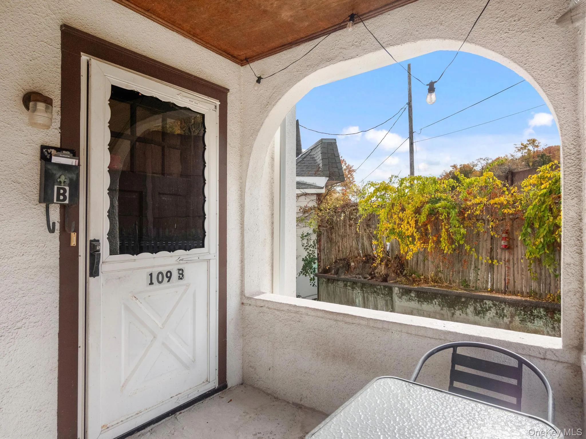 Entrance to property with stucco siding Entrance to property with stucco siding