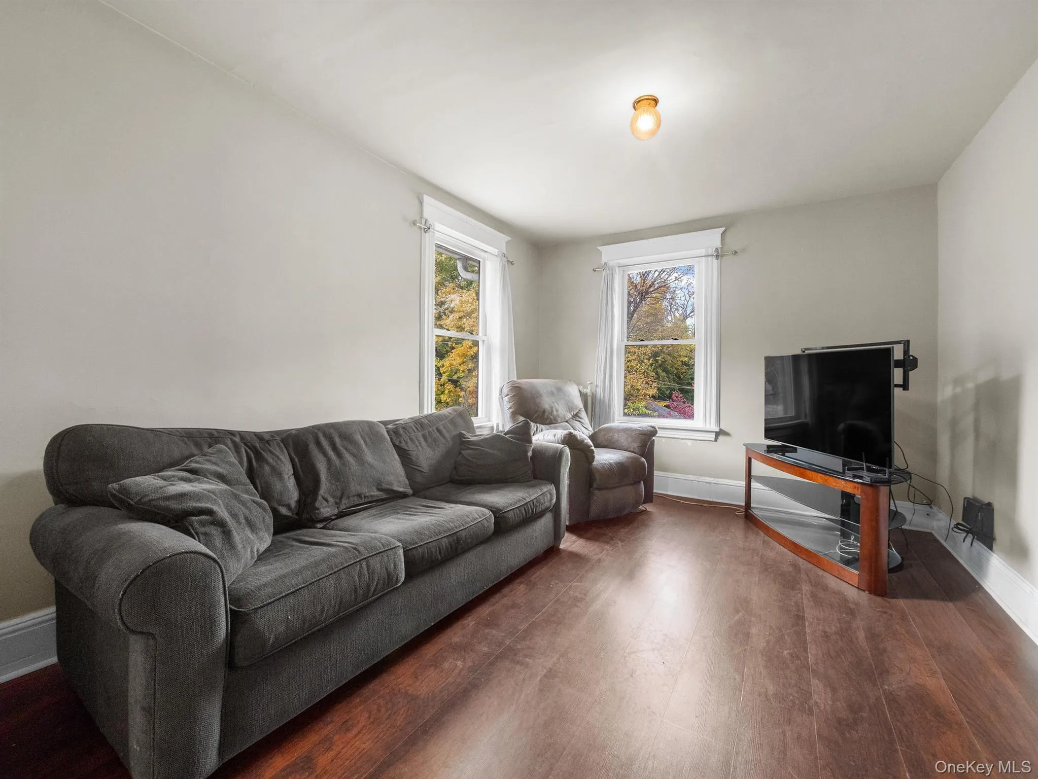 Living room featuring wood finished floors Living room featuring wood finished floors