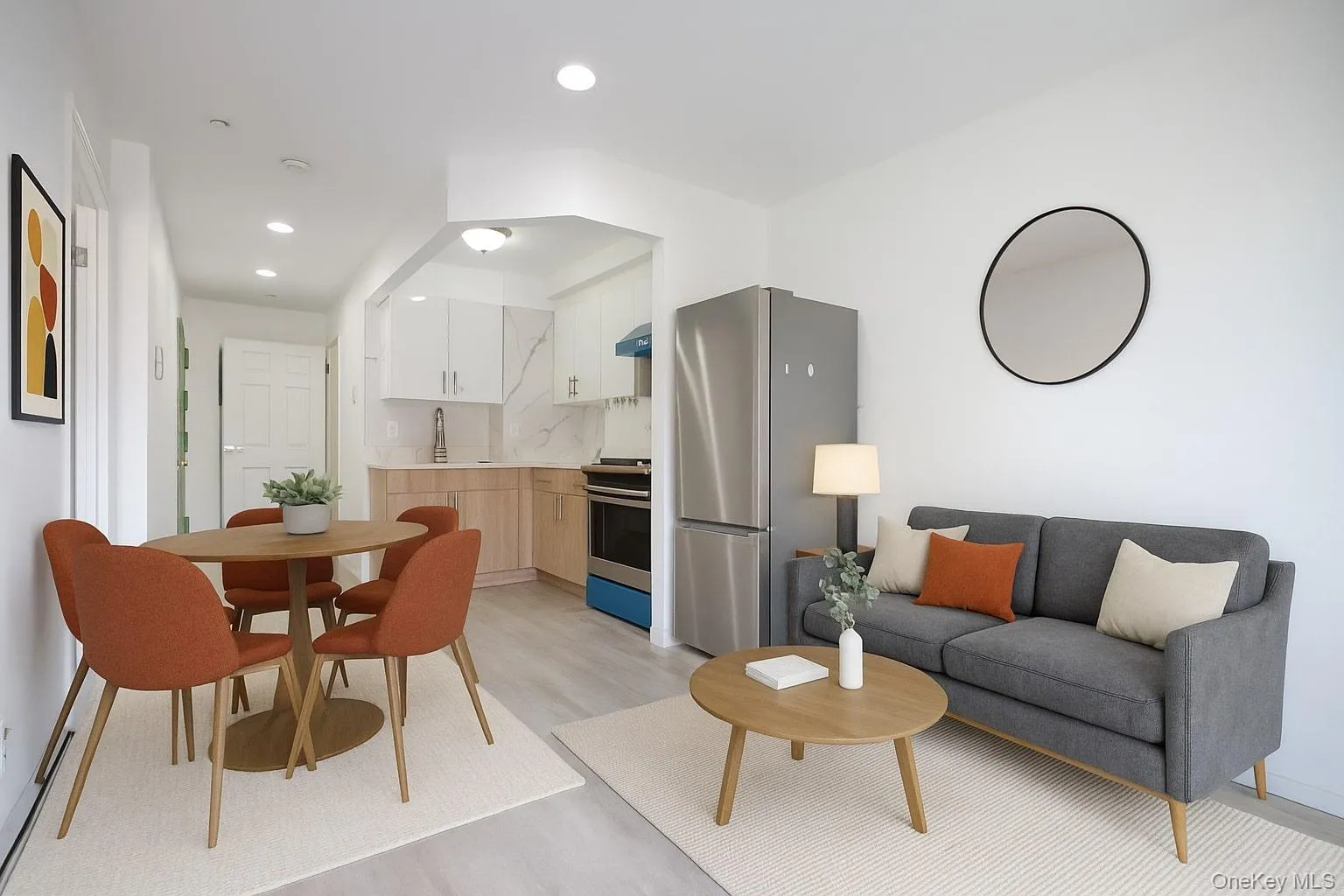 Virtually staged living area with light wood finished floors, recessed lighting, and virtually staged modern furniture Virtually staged living area with light wood finished floors, recessed lighting, and virtually staged modern furniture