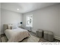 Bedroom featuring baseboards and recessed lighting Bedroom featuring baseboards and recessed lighting