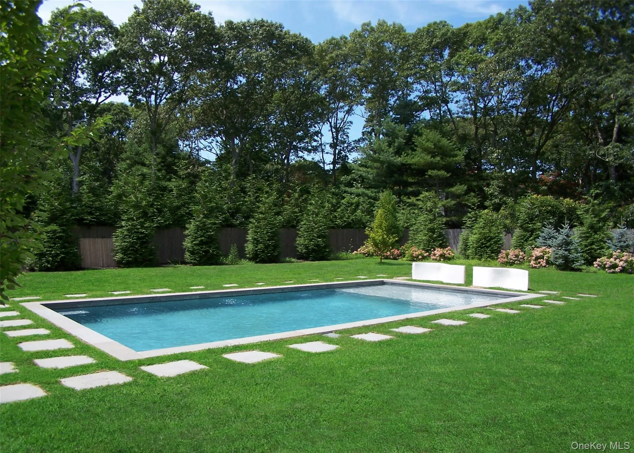 View of swimming pool with a patio View of swimming pool with a patio