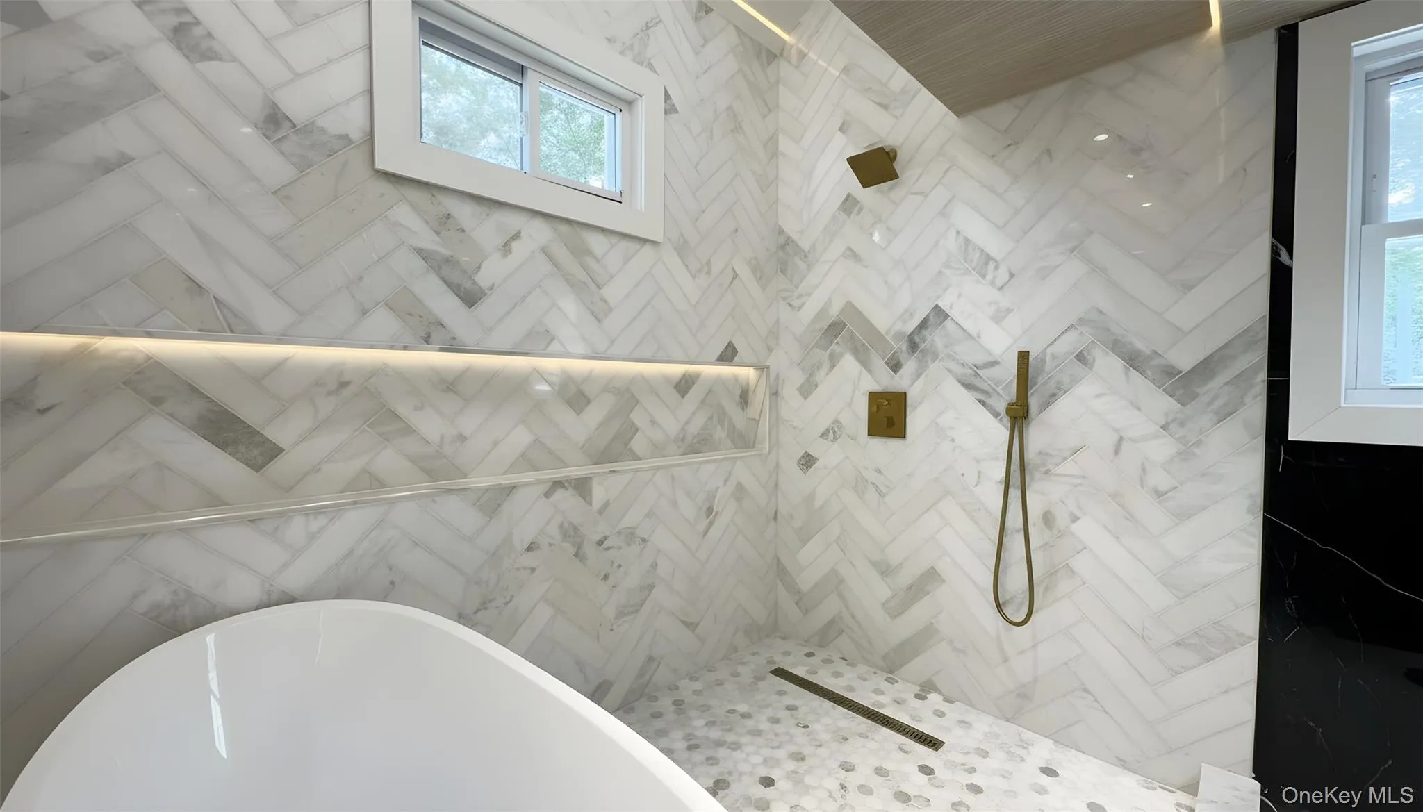Full bathroom featuring tiled shower and a soaking tub Full bathroom featuring tiled shower and a soaking tub