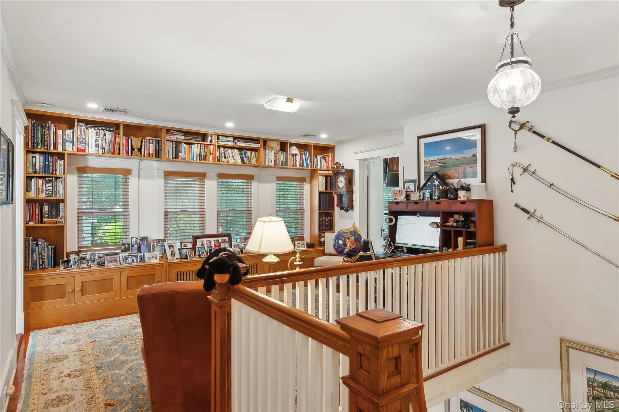 Home office with plenty of natural light and ornamental molding Home office with plenty of natural light and ornamental molding