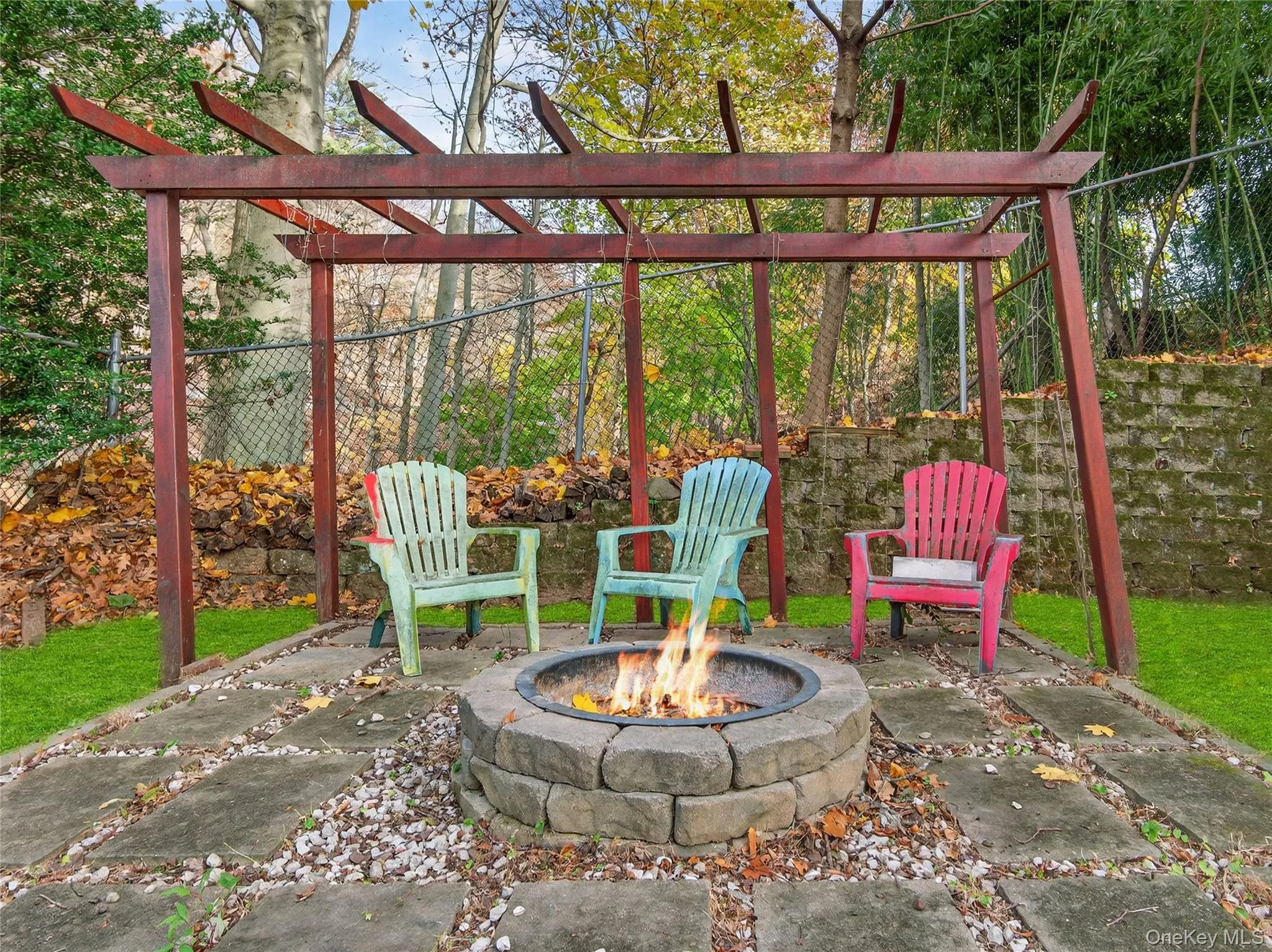 View of patio featuring a pergola View of patio featuring a pergola