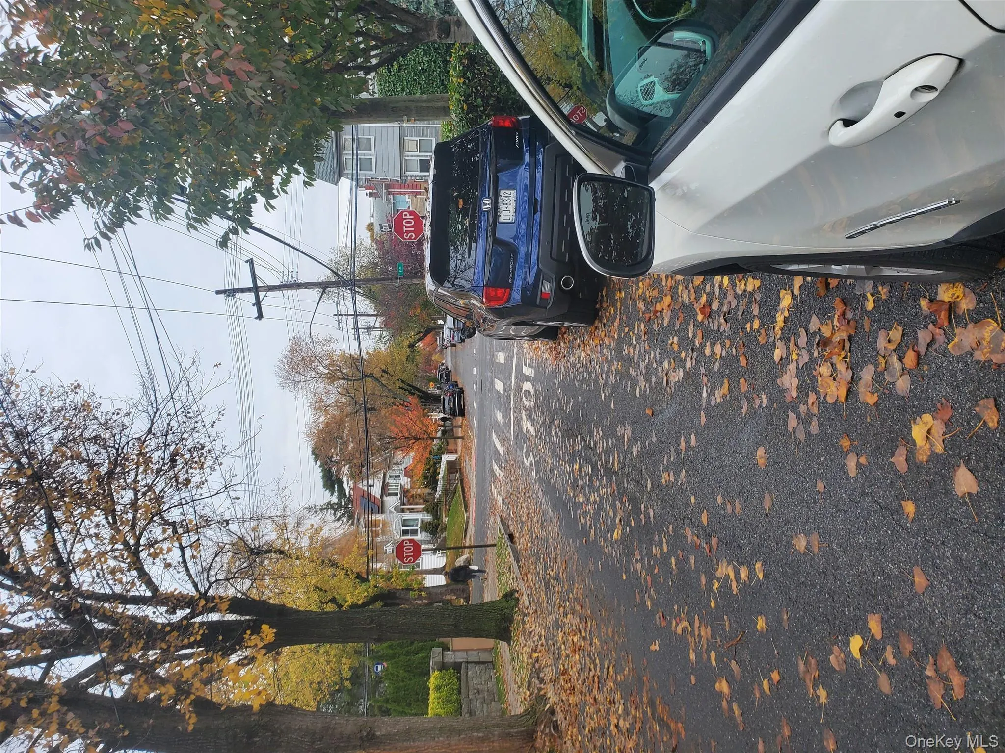 View of asphalt road with traffic signs View of asphalt road with traffic signs