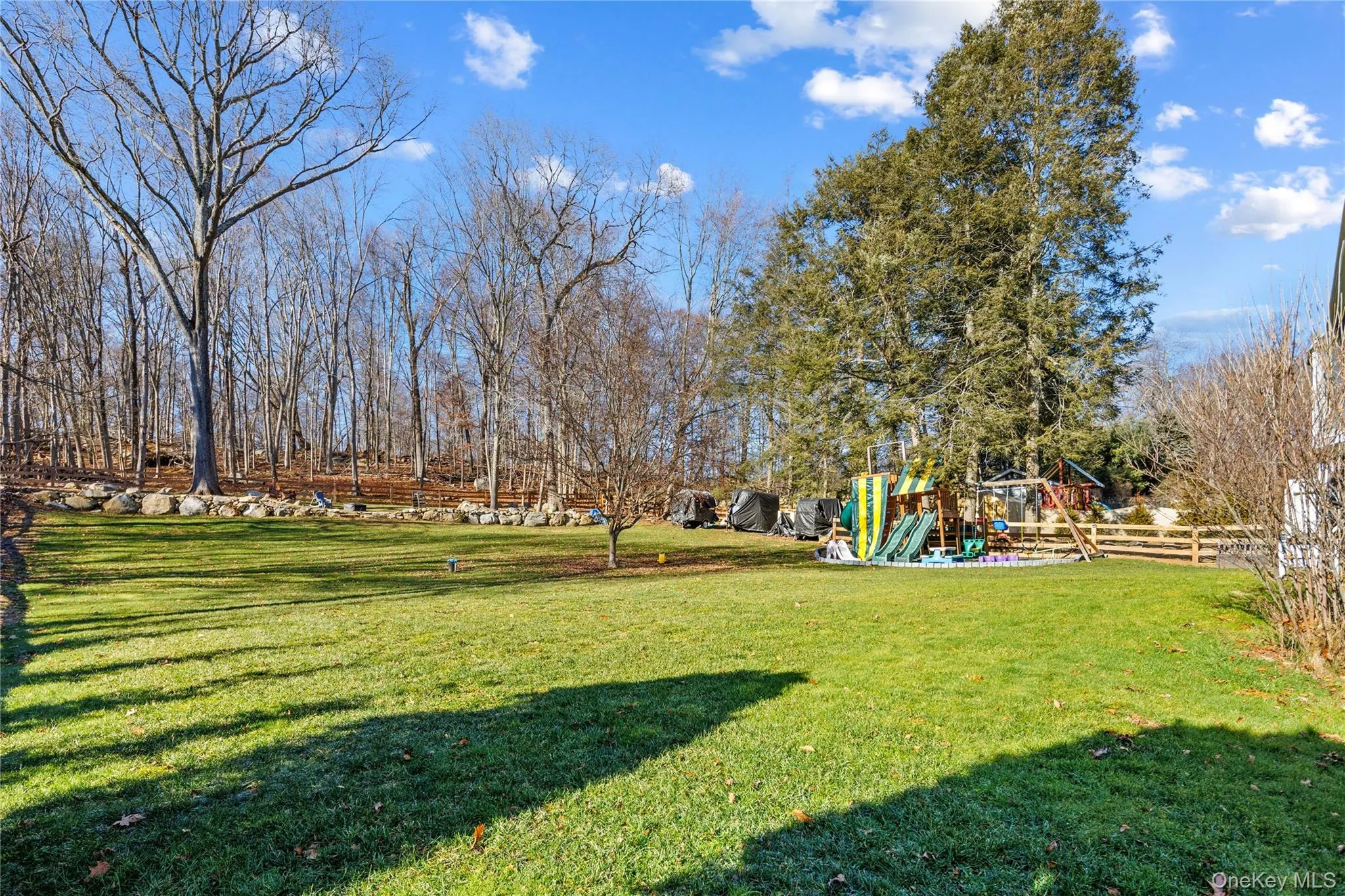 View of yard with a playground View of yard with a playground