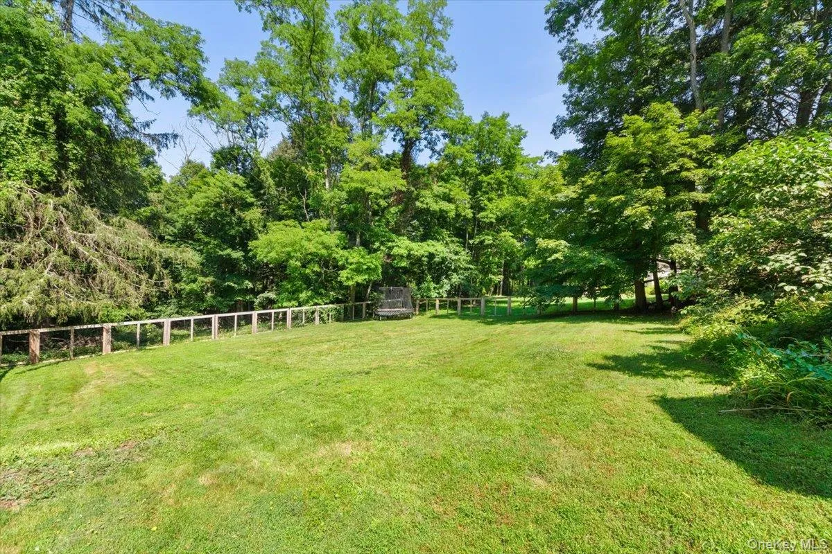 Another angle of the Expansive Fenced in Backyard Another angle of the Expansive Fenced in Backyard