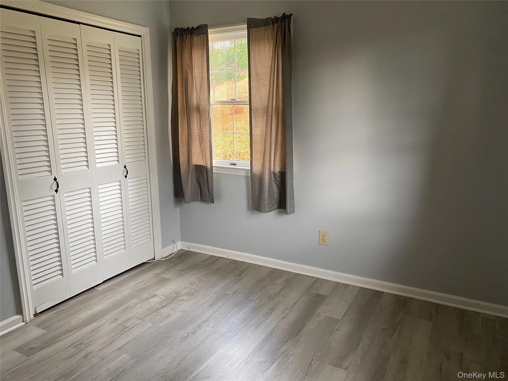 Bedroom with a closet Bedroom with a closet