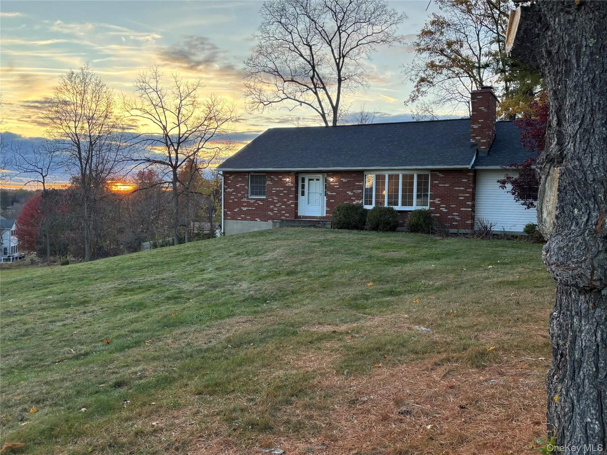 View of front of property featuring beautiful yard View of front of property featuring beautiful yard