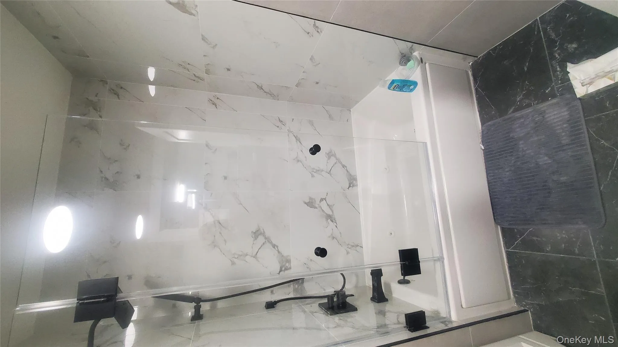 Full bath featuring bathtub / shower combination Full bath featuring bathtub / shower combination