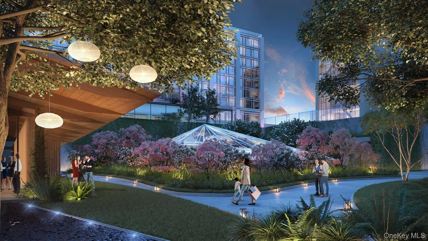 View of property's community featuring a lawn View of property's community featuring a lawn