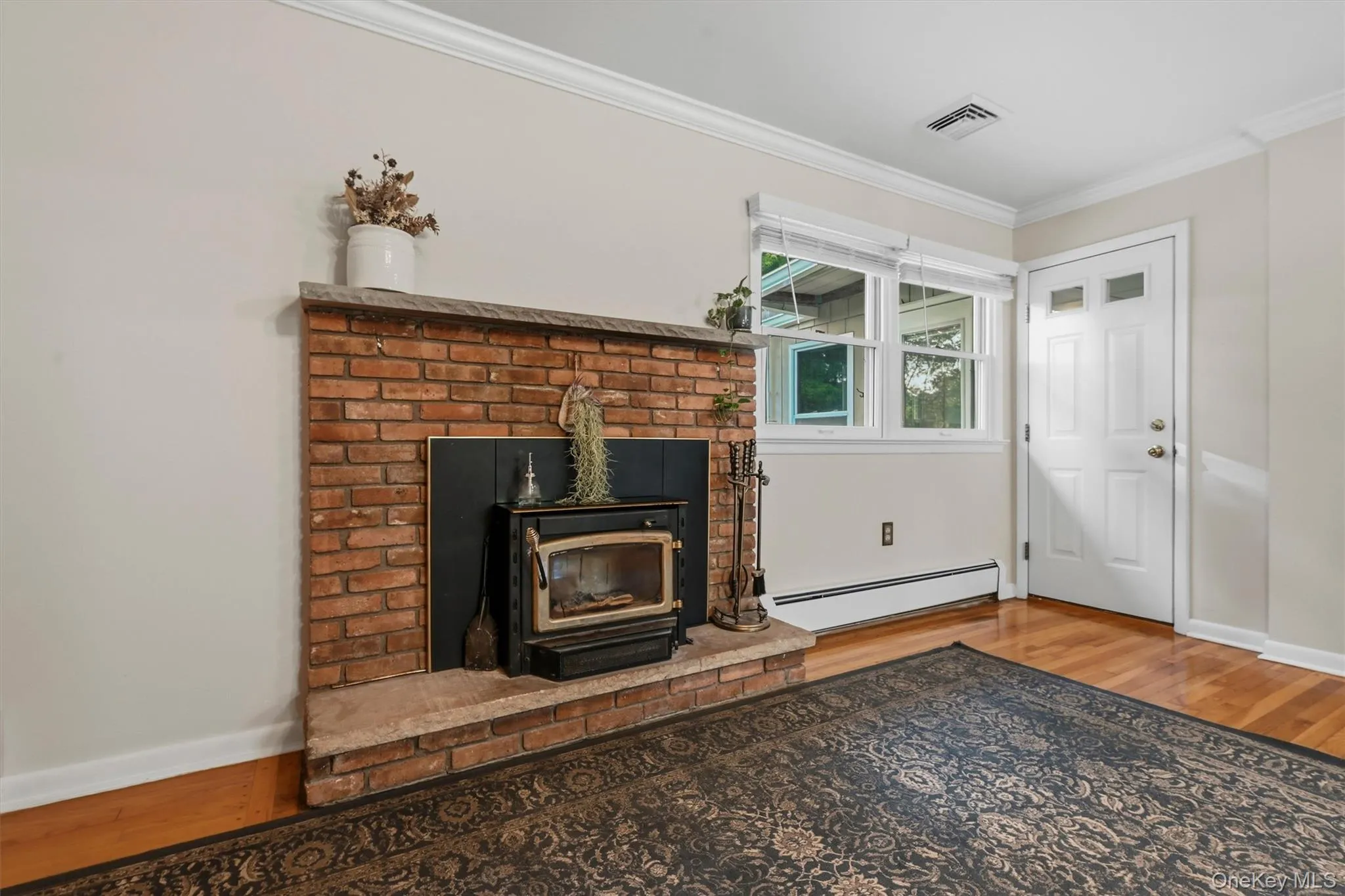 ...the wood-burning insert in this working fireplace will make this living room so comfy in the winter --or anytime! ...the wood-burning insert in this working fireplace will make this living room so comfy in the winter --or anytime!
