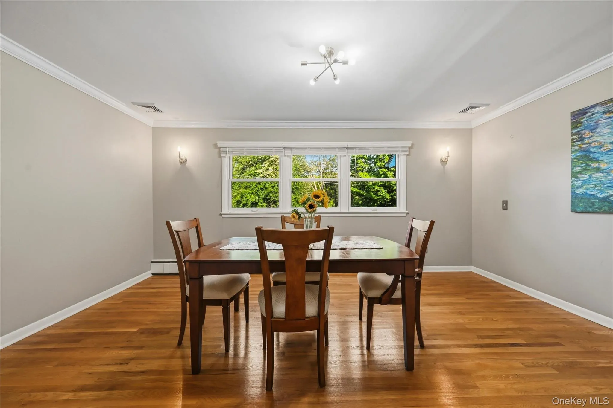 a dedicated dining room which could accommodate a larger table, or be re-purposed. The view outside the window is of the beautiful park opposite the home... a dedicated dining room which could accommodate a larger table, or be re-purposed. The view outside the window is of the beautiful park opposite the home...