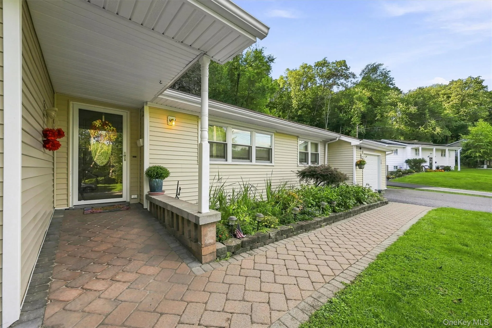 A welcoming entry, with attractive pavers welcomes you inside... A welcoming entry, with attractive pavers welcomes you inside...