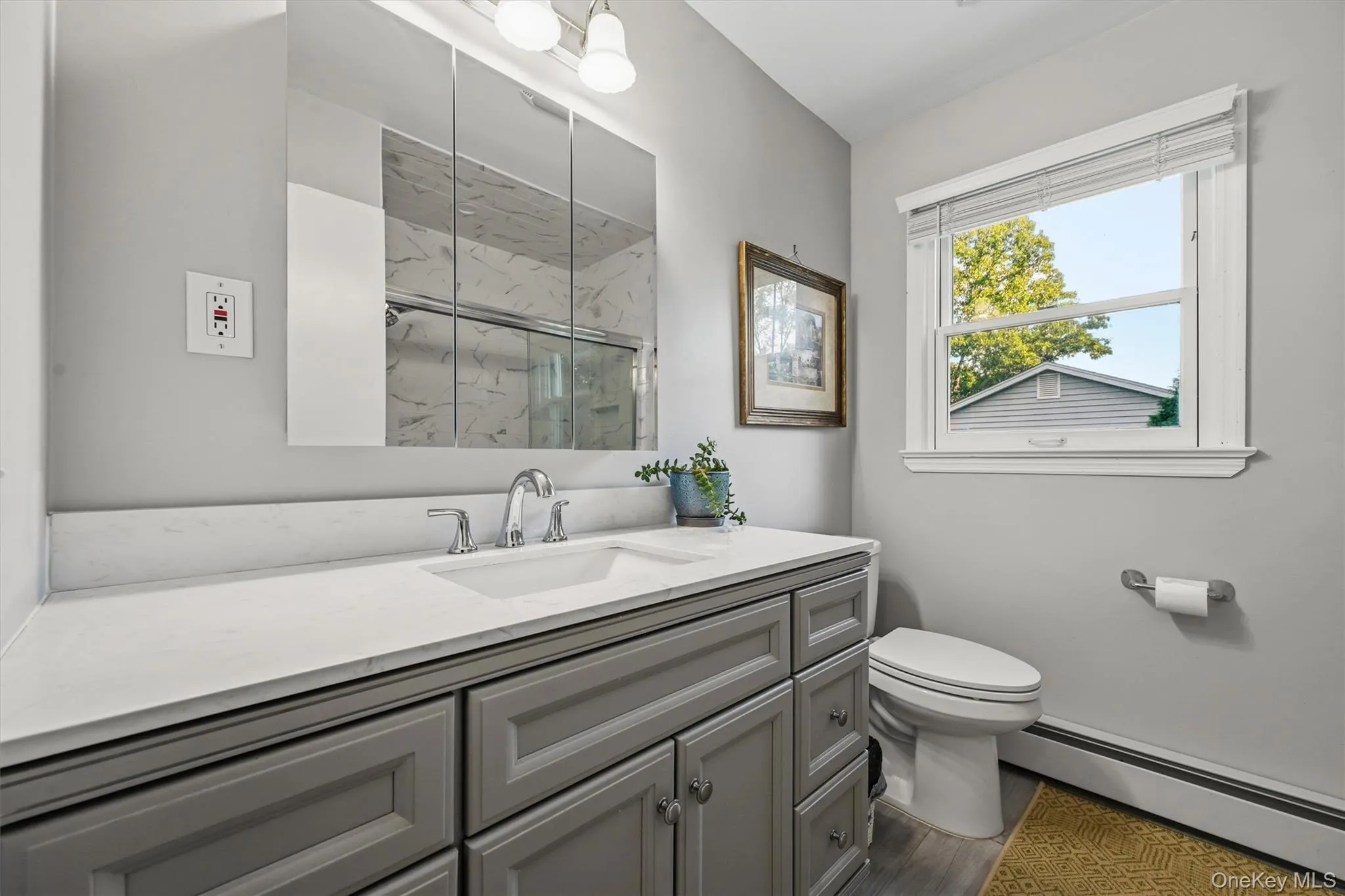 the home's other full bathroom, also with a window, and tasteful cabinetry for storage ... the home's other full bathroom, also with a window, and tasteful cabinetry for storage ...