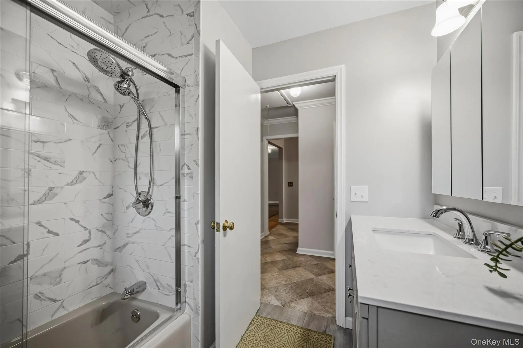 ...one large sink leaves extra counter space and there is a bathtub/shower combination... ...one large sink leaves extra counter space and there is a bathtub/shower combination...