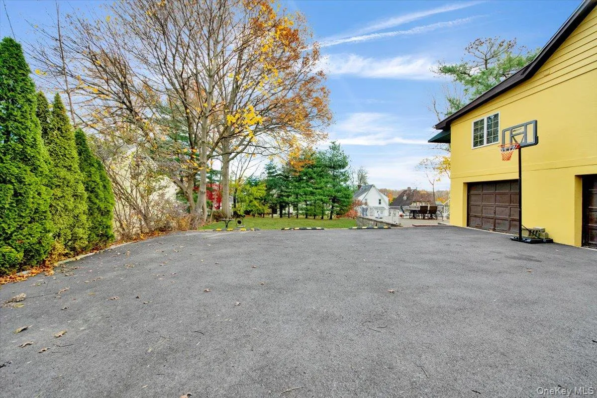 Asphalt driveway and attached garage Asphalt driveway and attached garage