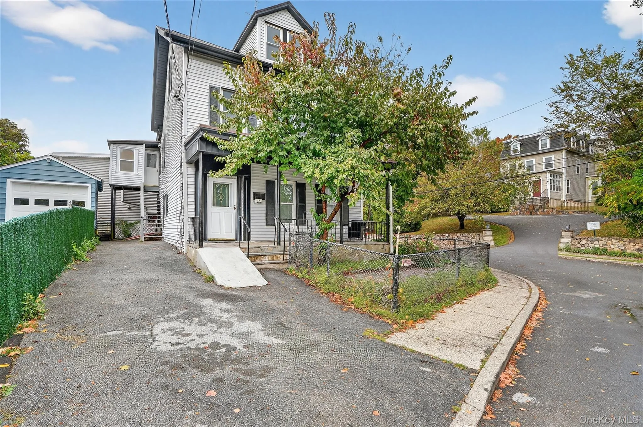 Second empire-style home with an outdoor structure Second empire-style home with an outdoor structure