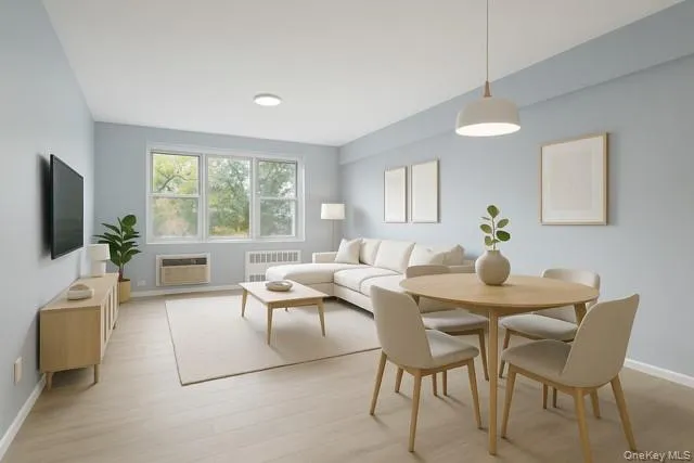 Virtually Staged image of the open living and dining area. Virtually Staged image of the open living and dining area.