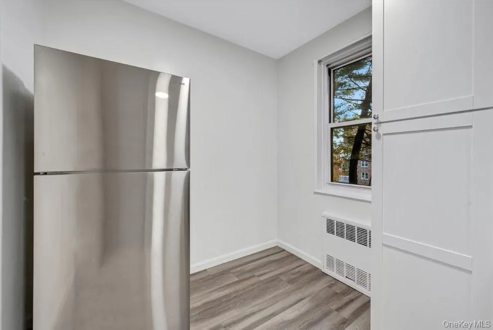 View of the window in the kitchen where additional cabinets/counters can be placed or a small table with chairs. View of the window in the kitchen where additional cabinets/counters can be placed or a small table with chairs.