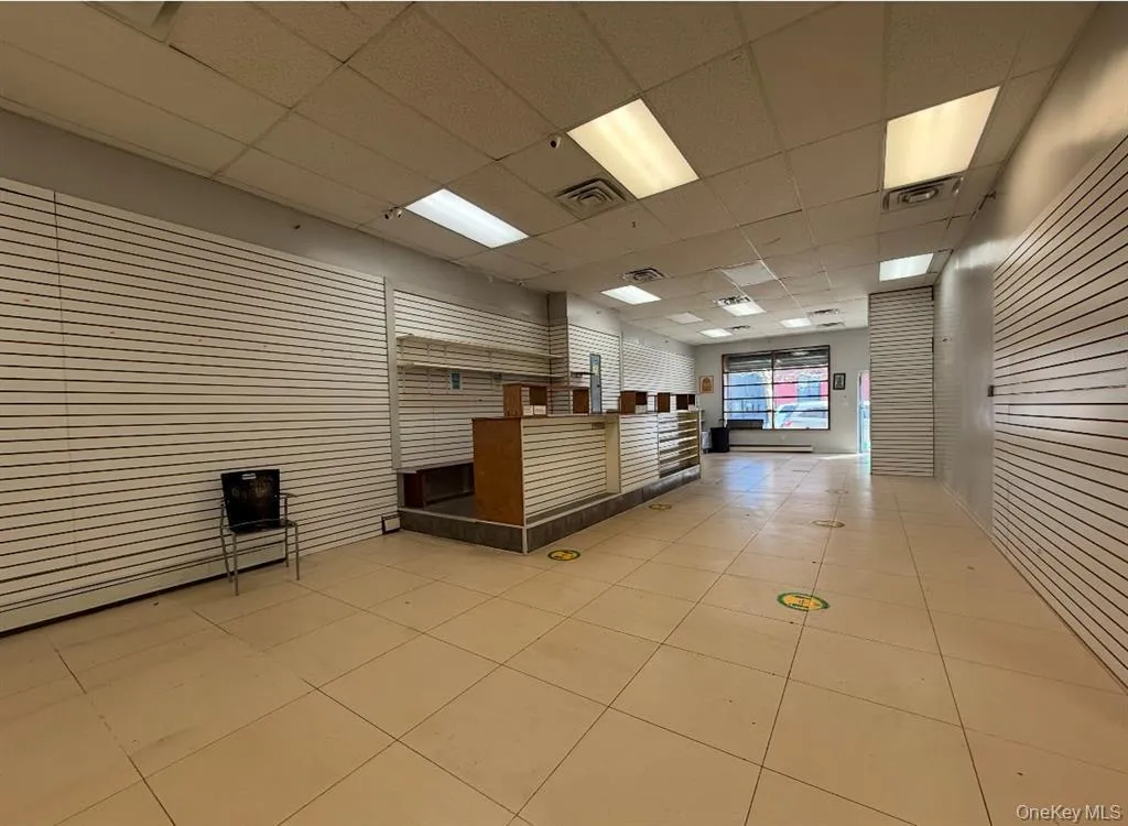 View of home's community featuring a drop ceiling View of home's community featuring a drop ceiling