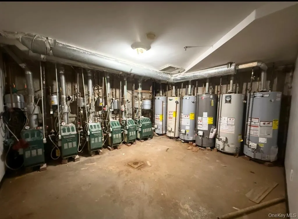 Utility room with gas water heater Utility room with gas water heater